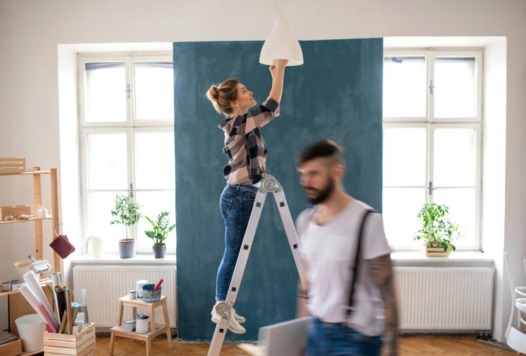 Couple renovating their home to increase value before a home appraisal