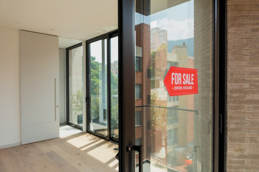 Urban apartment with for sale sign prepared for home appraisal