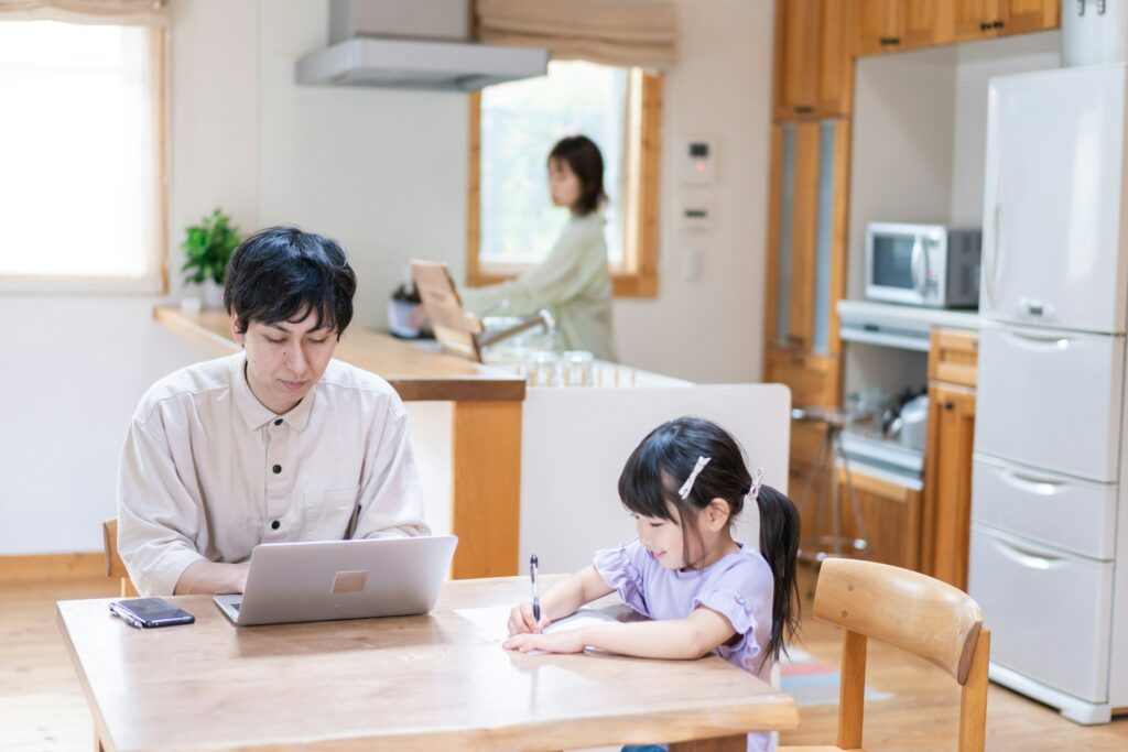 Family reviewing a home appraisal report together at the kitchen table