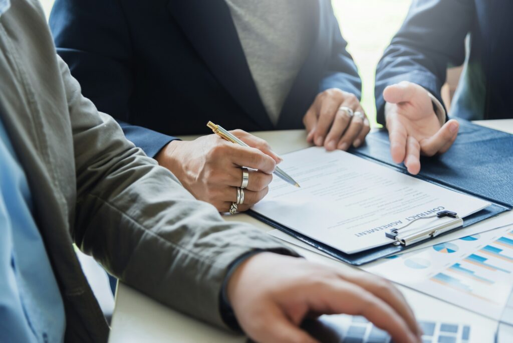 Divorcing spouses reviewing equity breakdown during a divorce appraisal session.