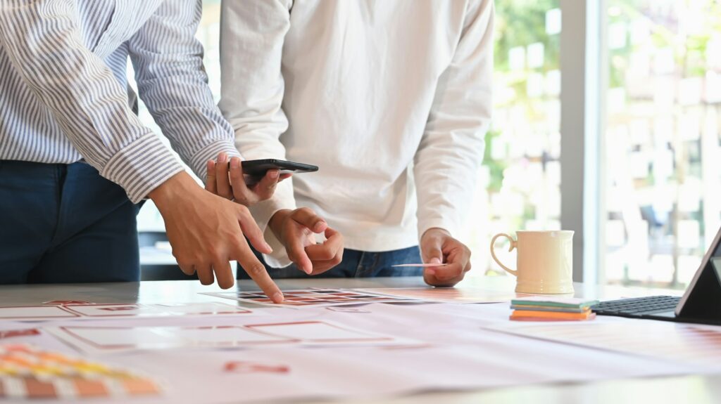 Appraiser and client reviewing a Pennsylvania appraisal to ensure accurate property valuation in a fast-moving market